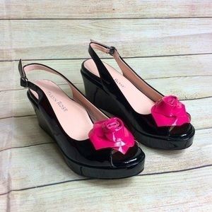 Taryn Rose “star” patent leather rose wedges.  Black slingback. Size 5